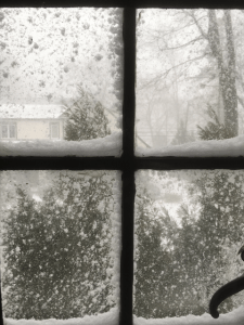 Snowstorm seen through a window