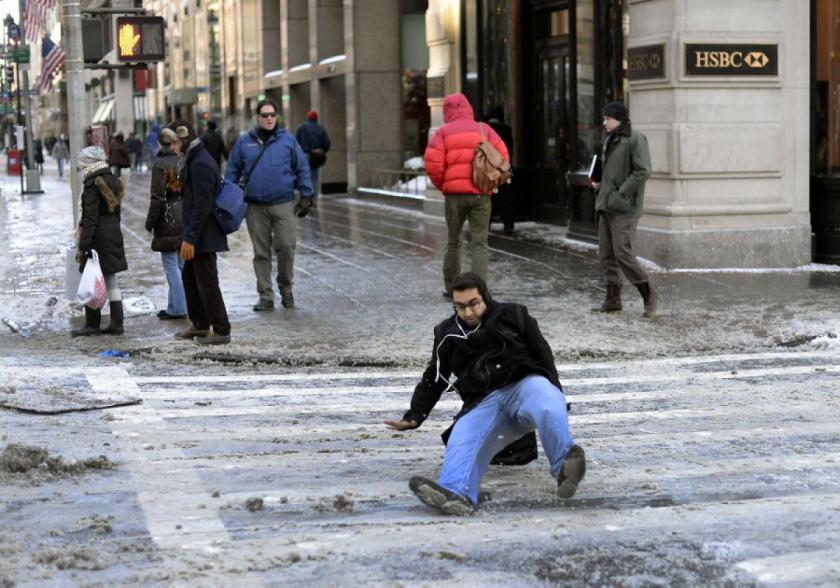 man slipping on crosswalk