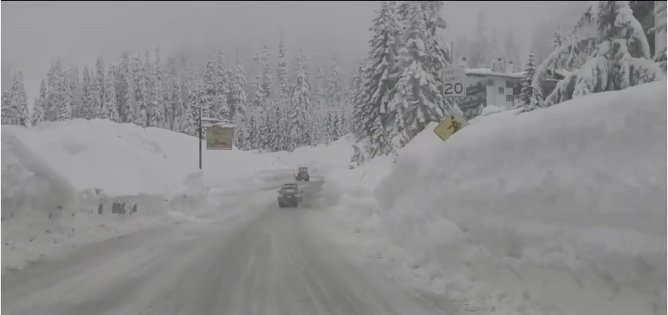 Snoqualmie pass highway surrounded by six-foot snowbanks, Jan. 2021